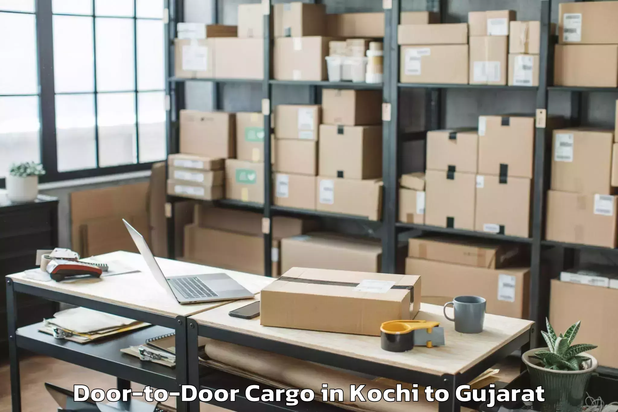 Book Kochi to Jhagadia Door To Door Cargo Online